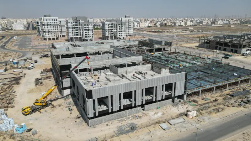 The finned corner block, with the first-floor slab in formwork behind it
